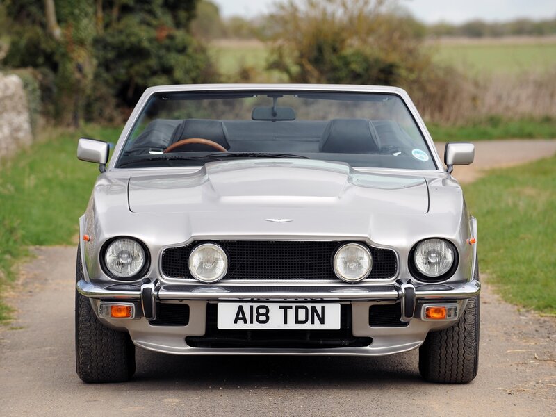 silver aston martin convertible