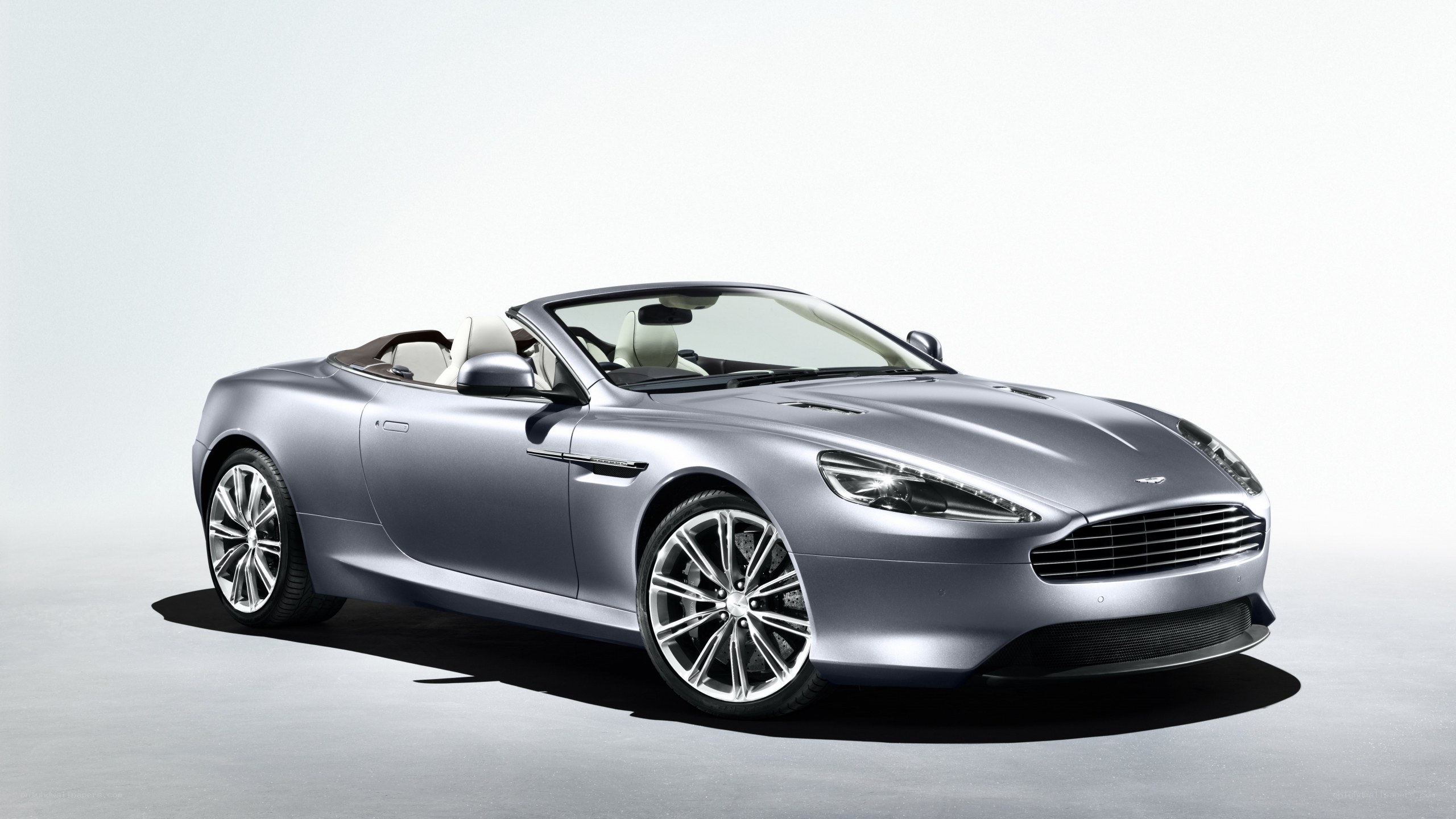 silver aston martin convertible
