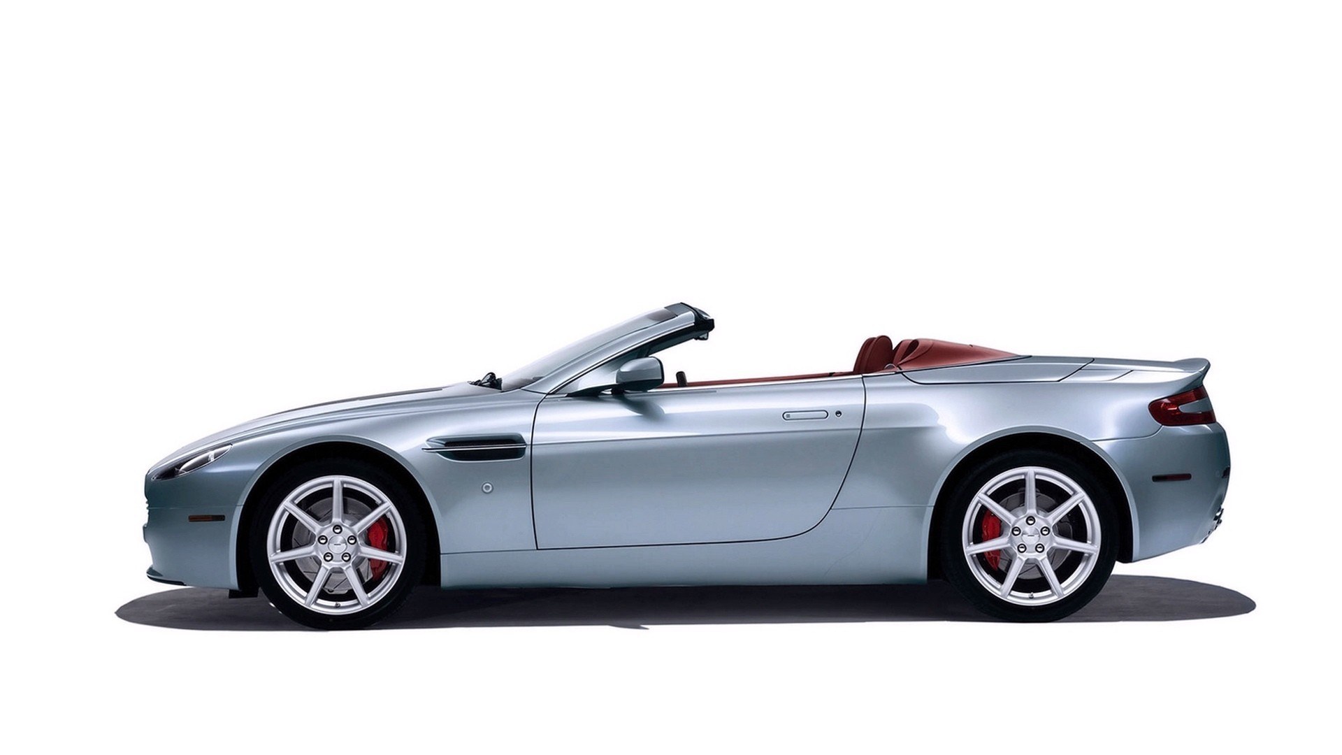 silver aston martin convertible