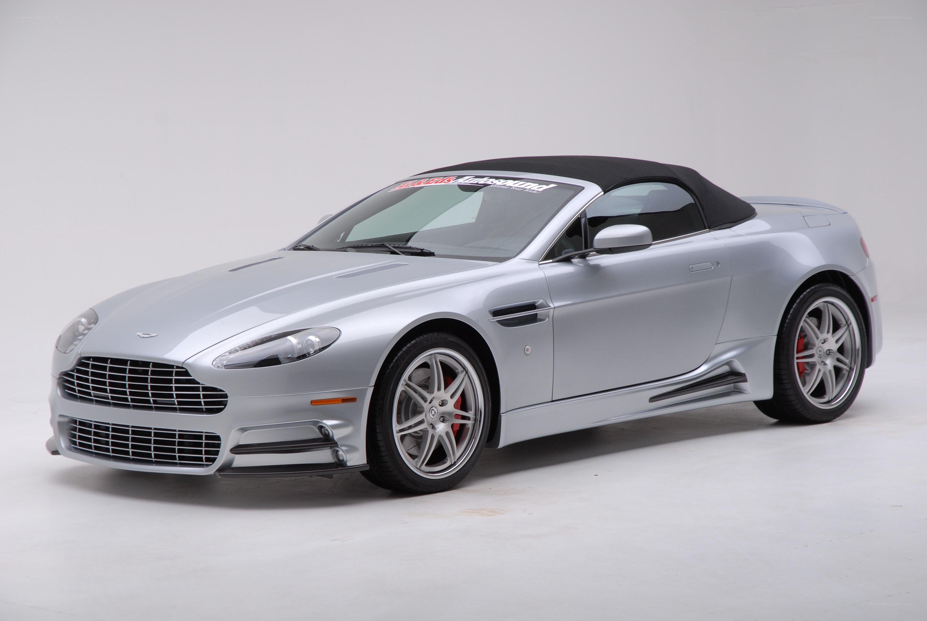 silver aston martin convertible