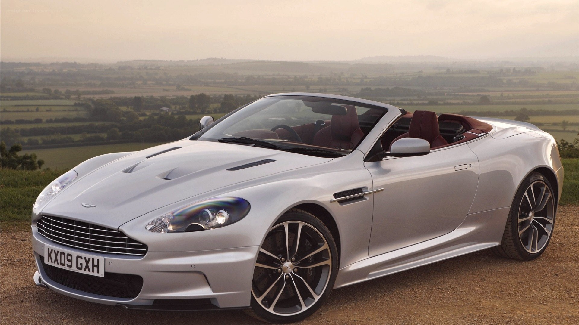 Silver Aston Martin convertible