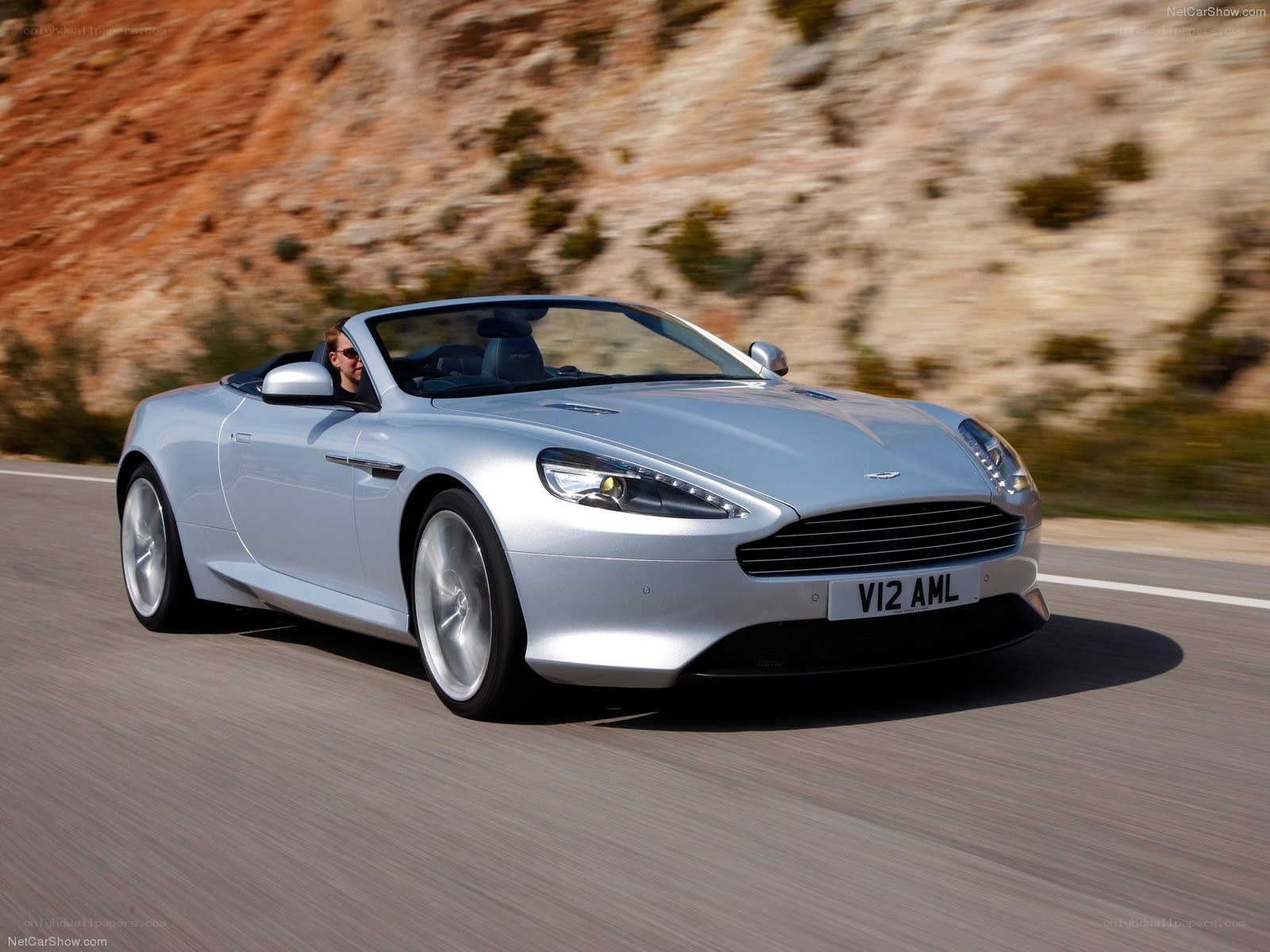 silver aston martin convertible