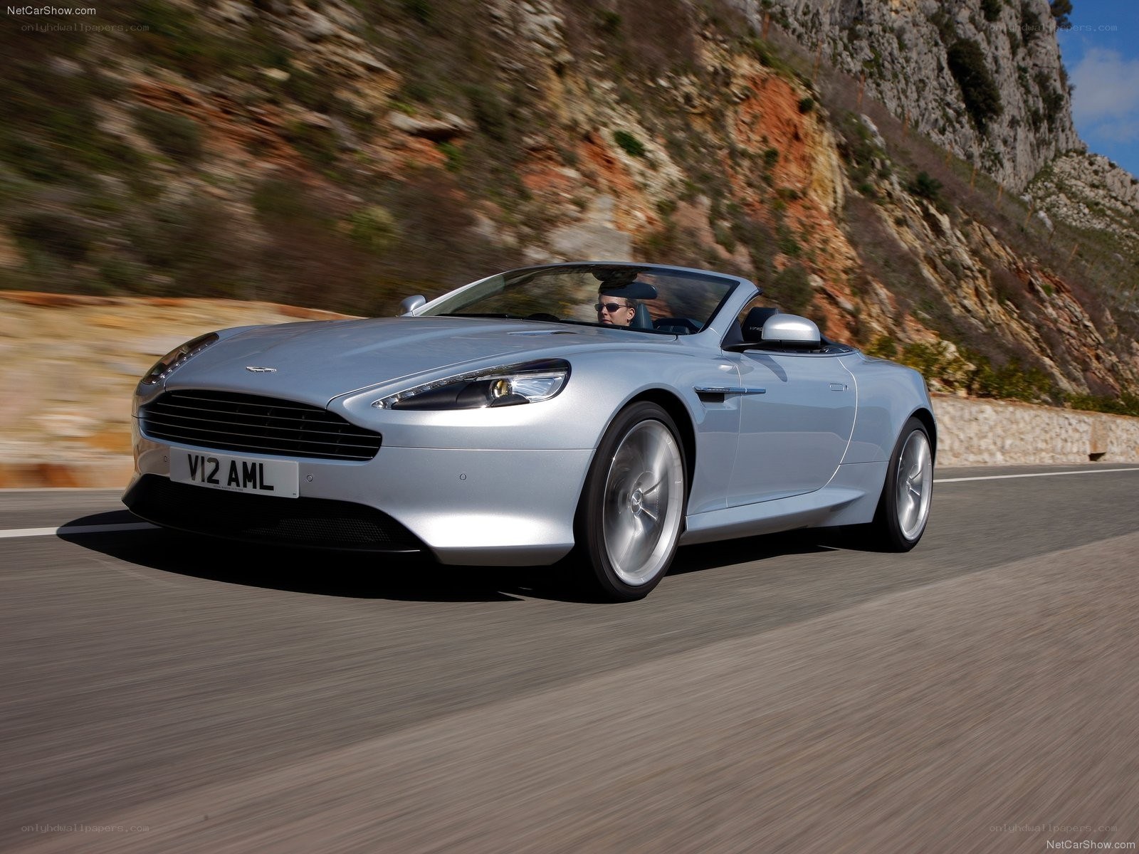 silver aston martin convertible