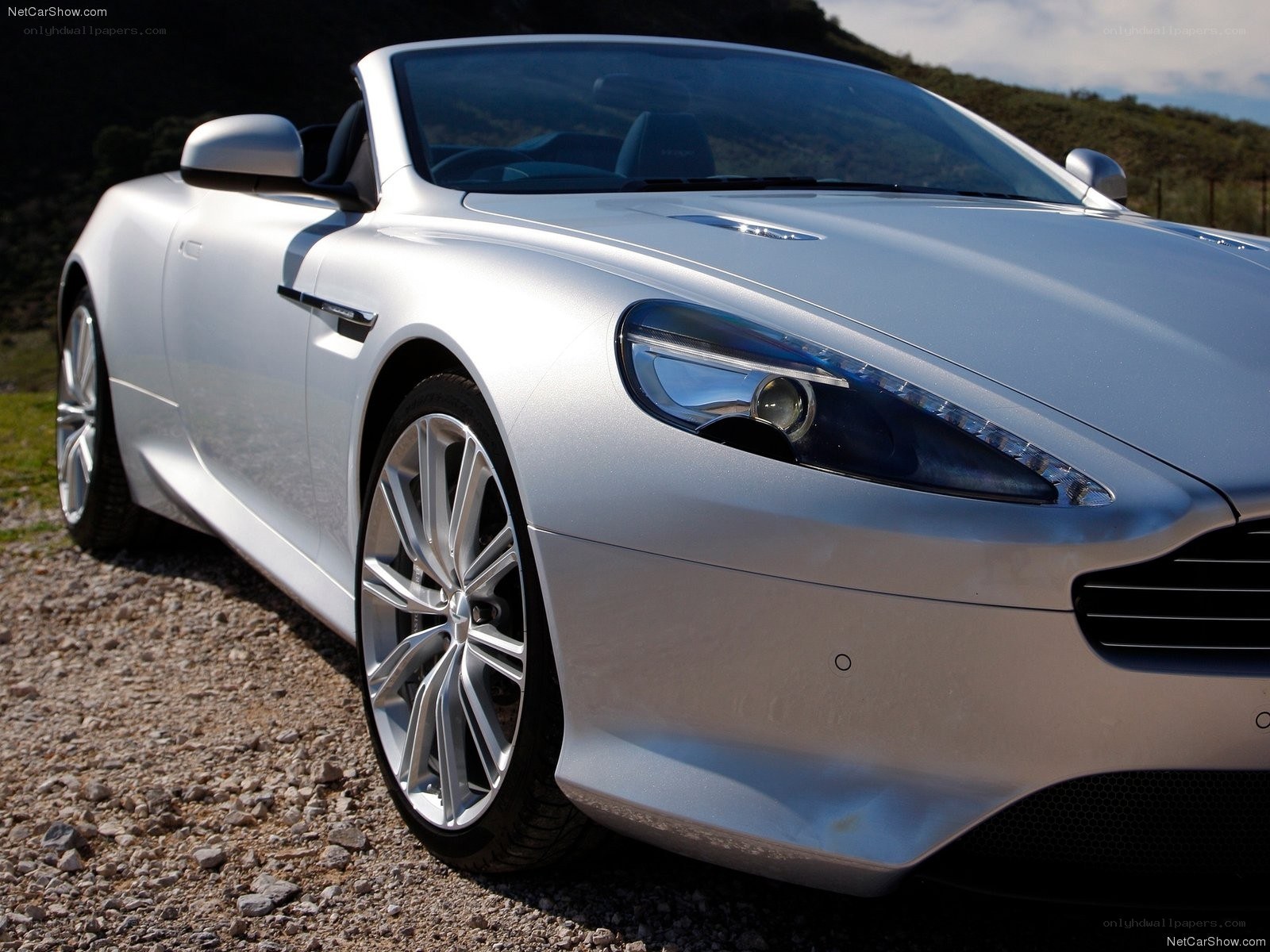 silver aston martin convertible