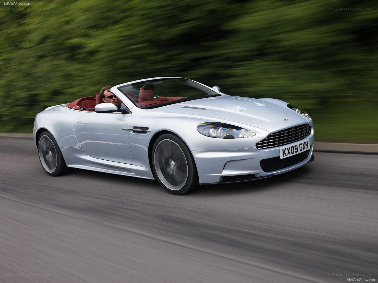 silver aston martin convertible