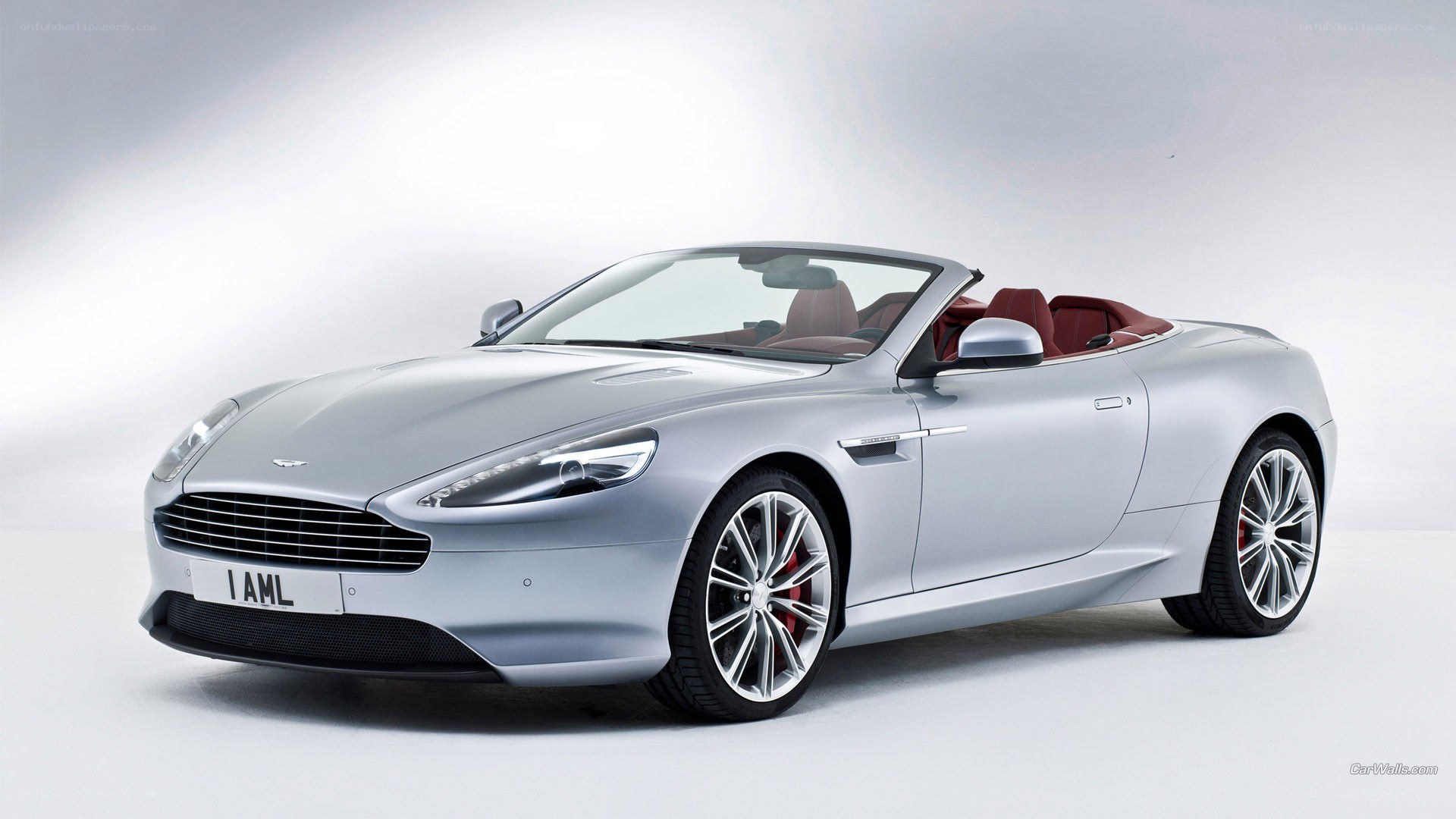 silver aston martin convertible
