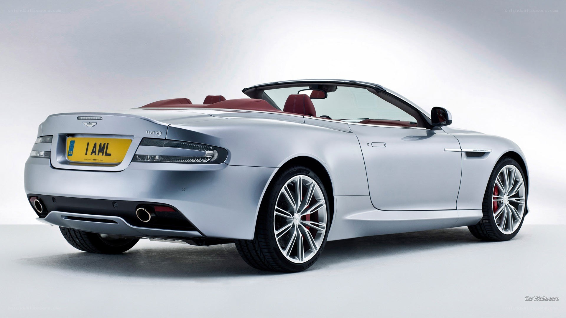 silver aston martin convertible