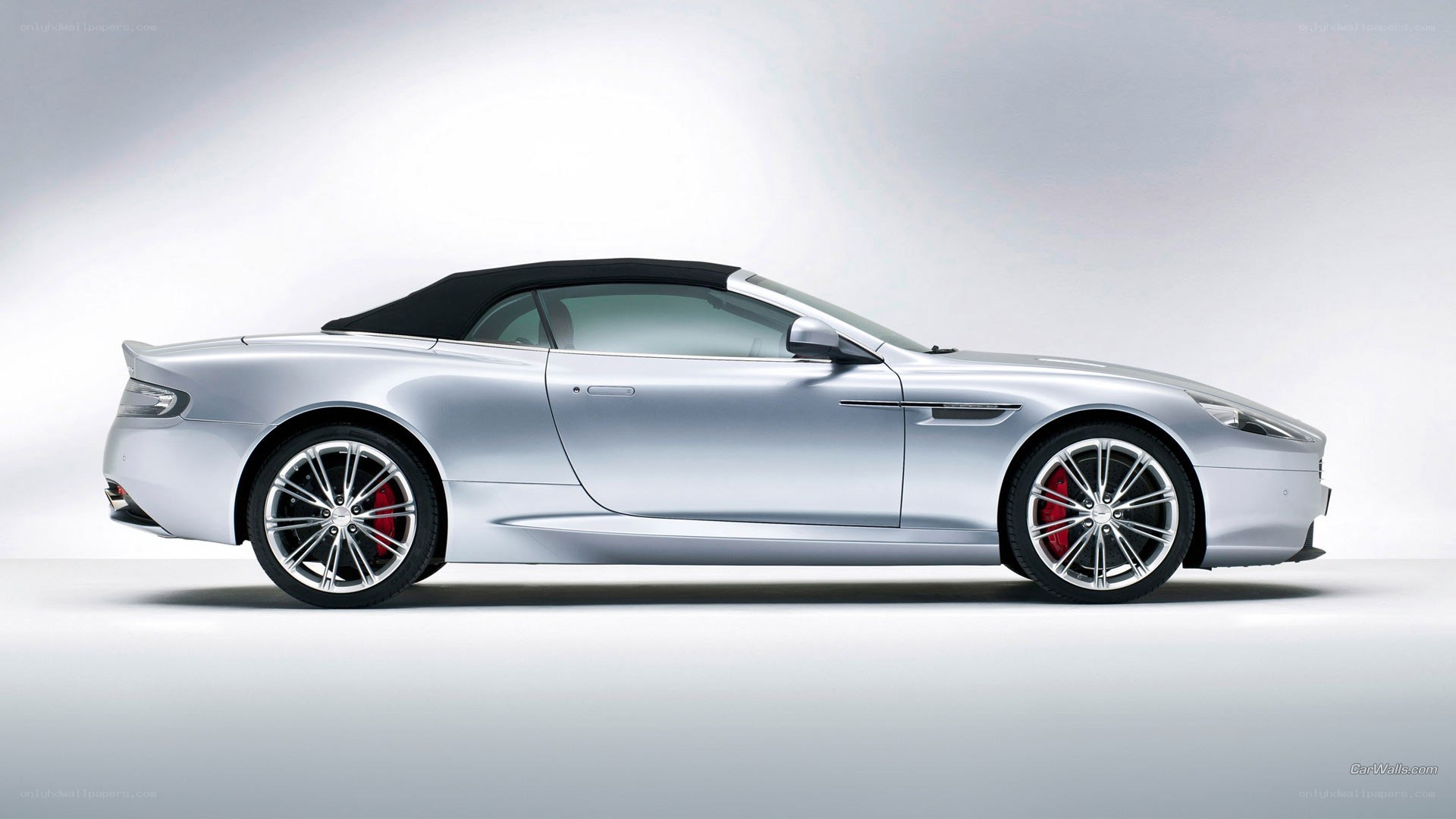 silver aston martin convertible