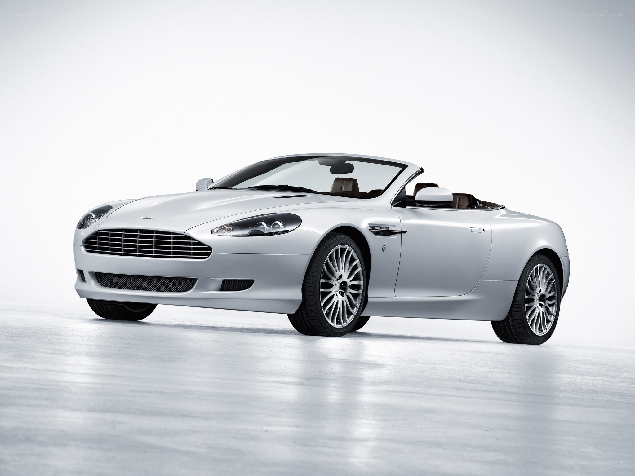 silver aston martin convertible