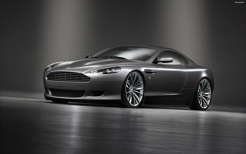 silver aston martin coupe