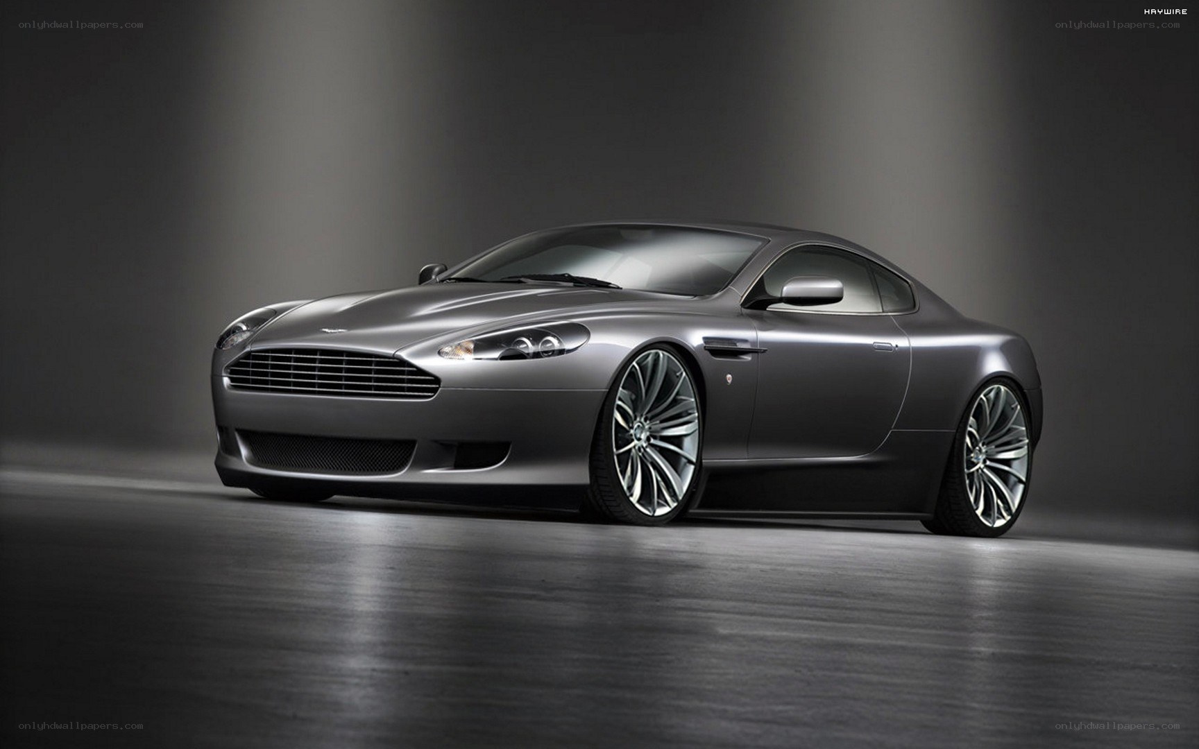 silver aston martin coupe