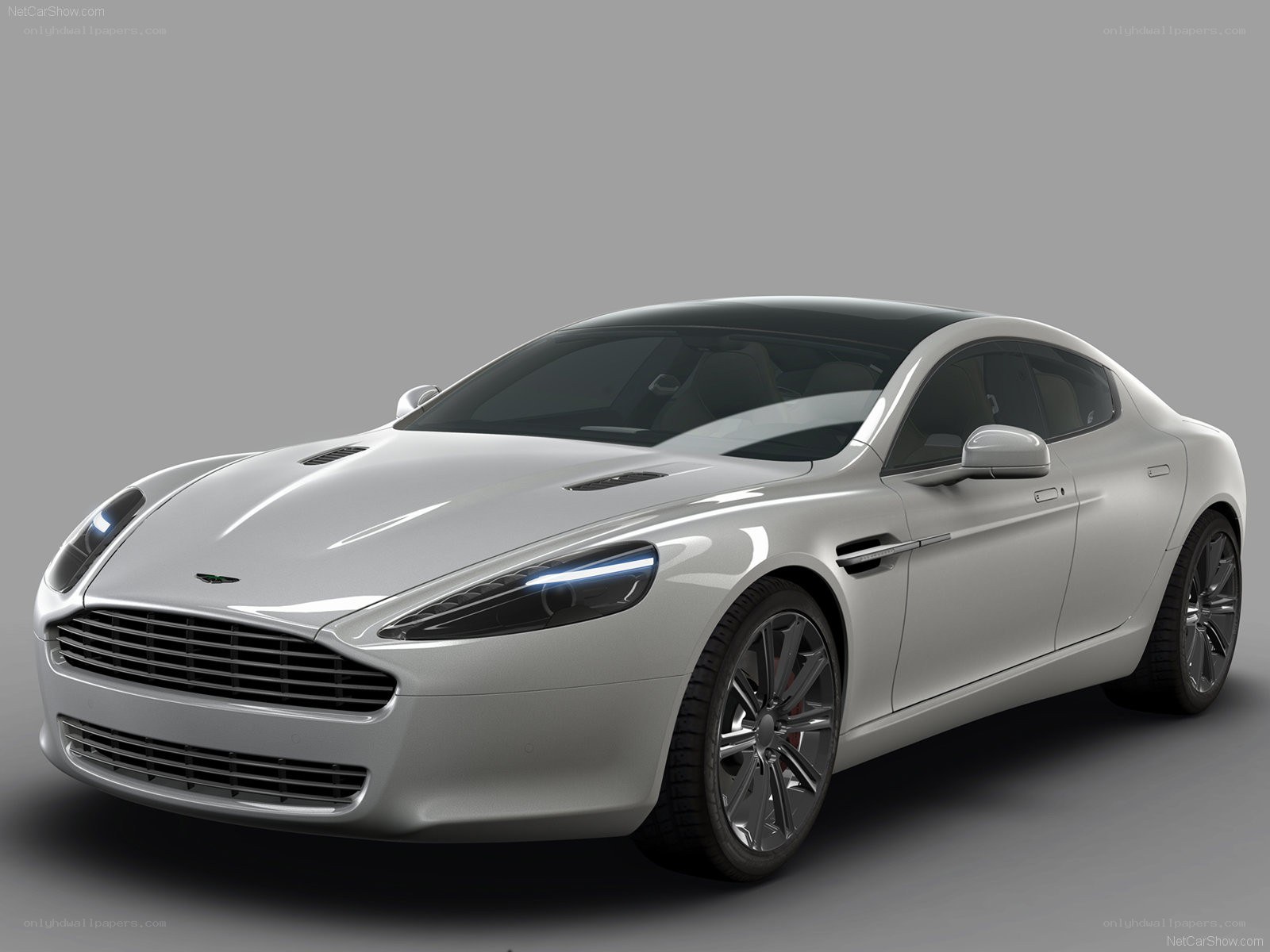 silver aston martin coupe