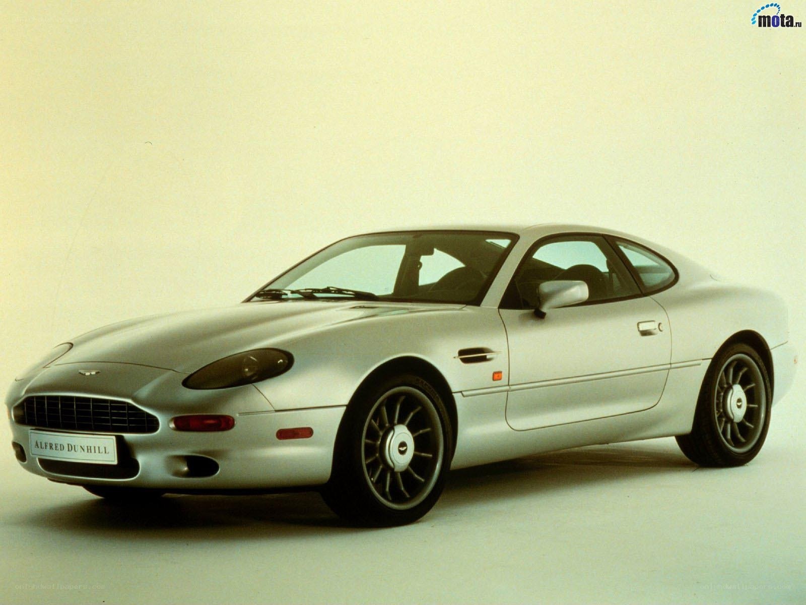 silver aston martin coupe