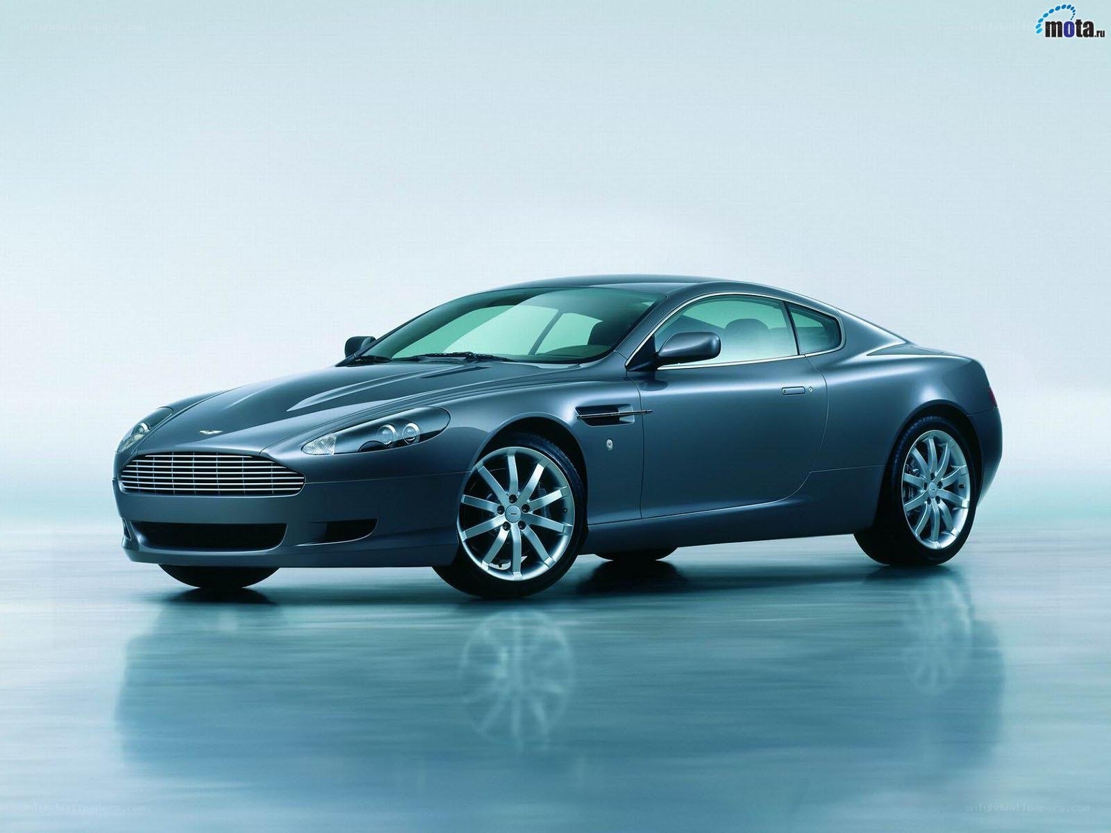 silver aston martin coupe