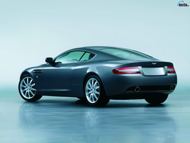 silver aston martin coupe