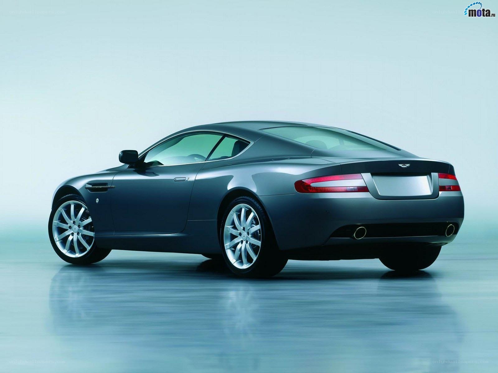 silver aston martin coupe