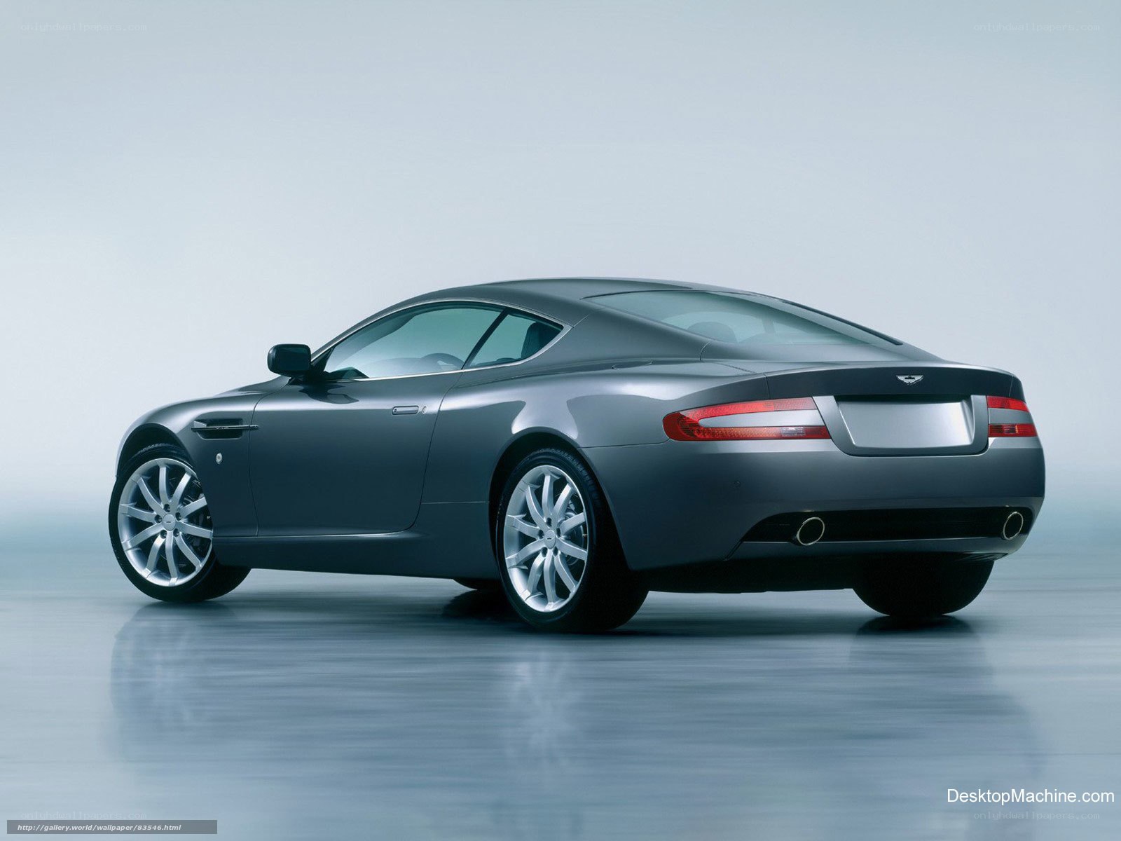 silver aston martin coupe