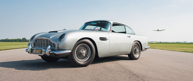 Silver Aston Martin DB5 on airfield
