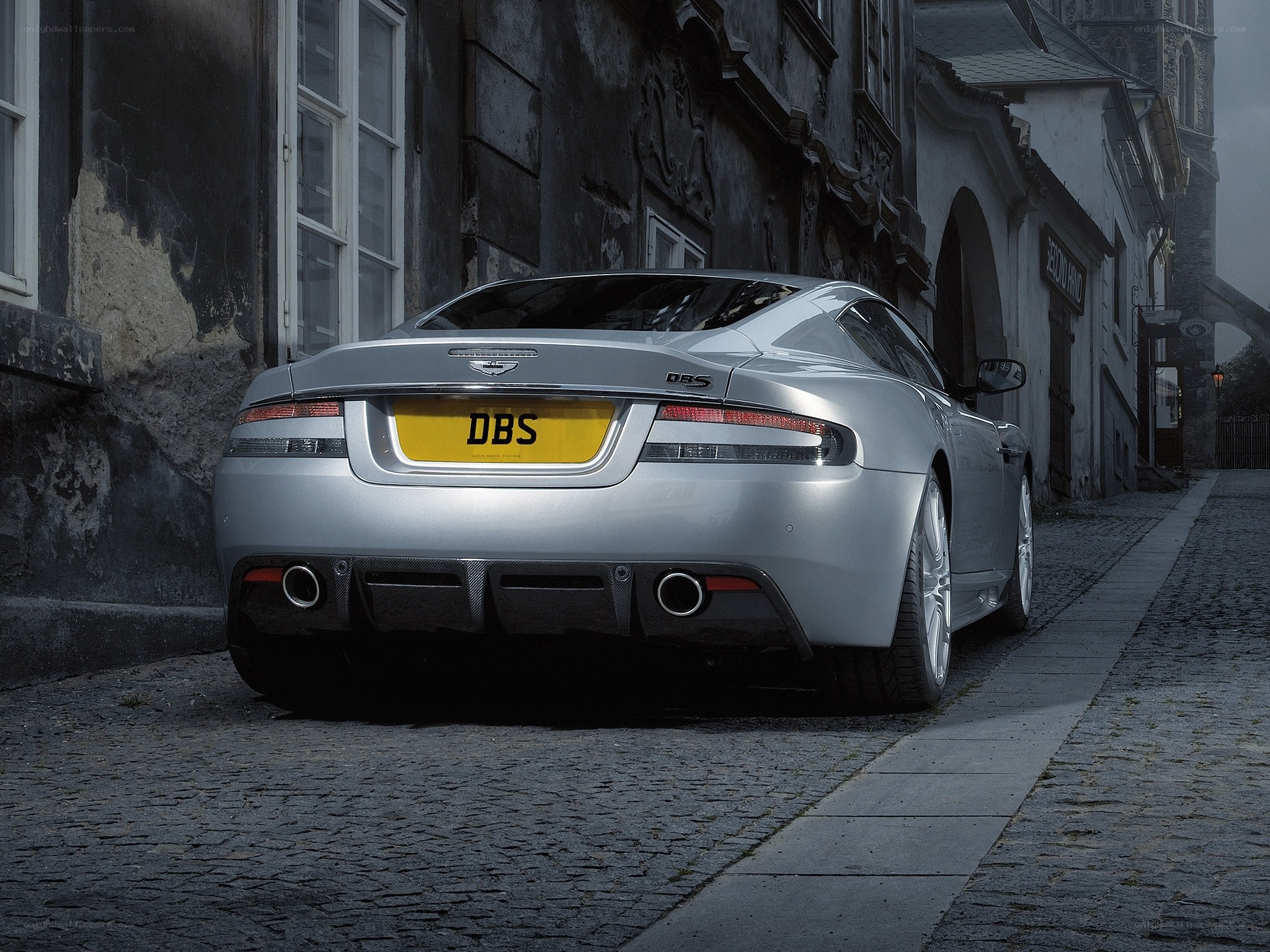 Silver Aston Martin DBS parked