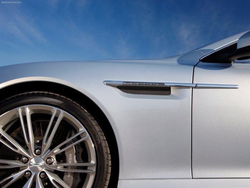 Silver Aston Martin — Dramatic