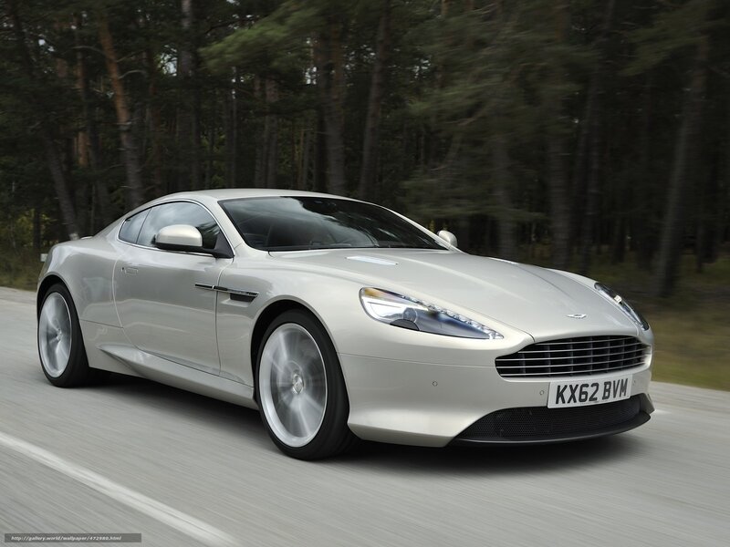 silver aston martin driving