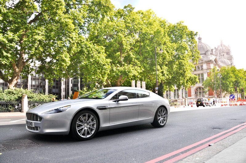 Silver Aston Martin on a city street