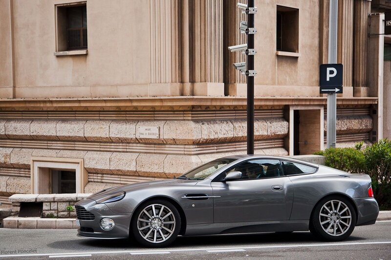Silver Aston Martin on city street