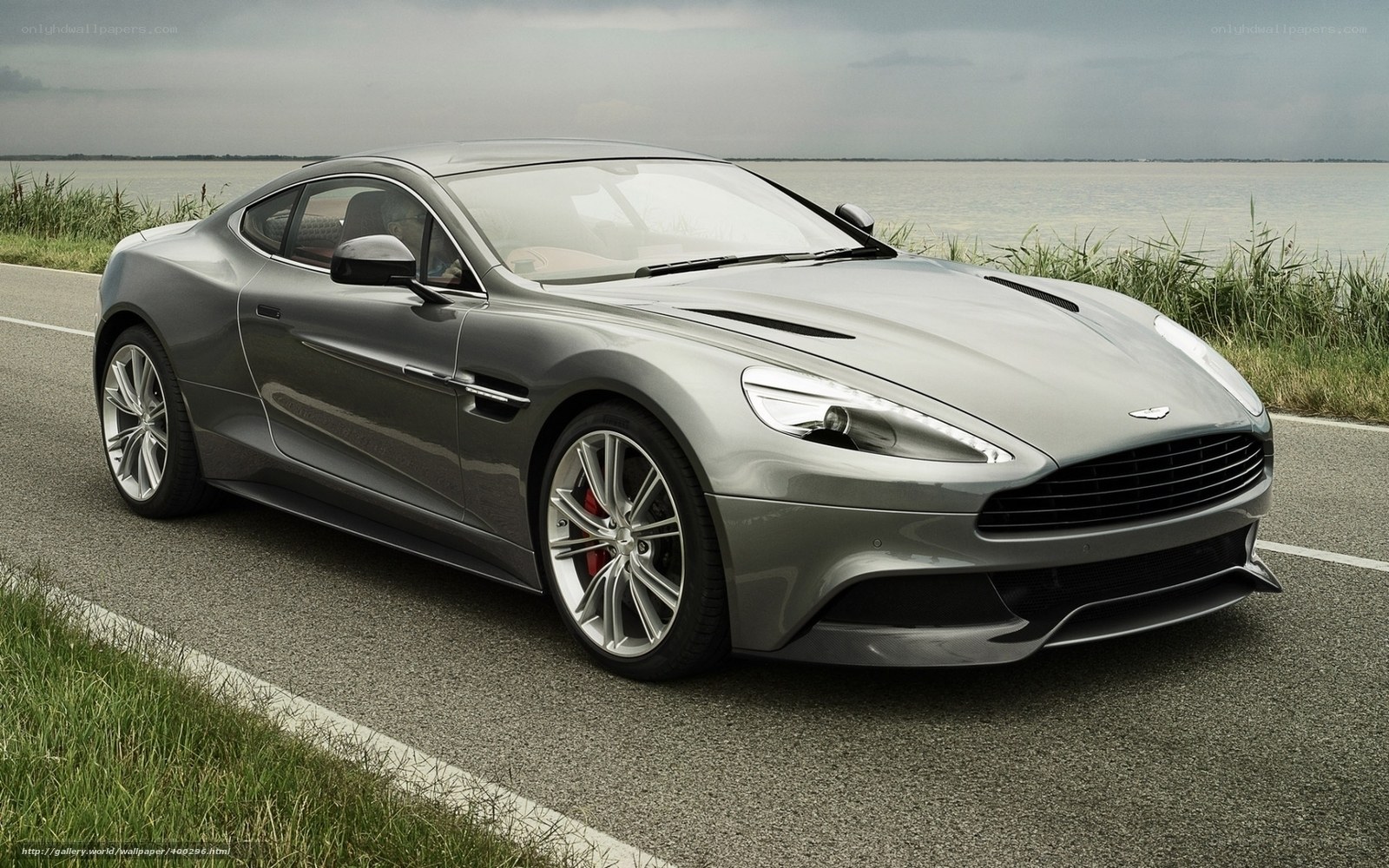 silver aston martin on road