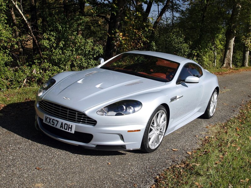silver aston martin on road
