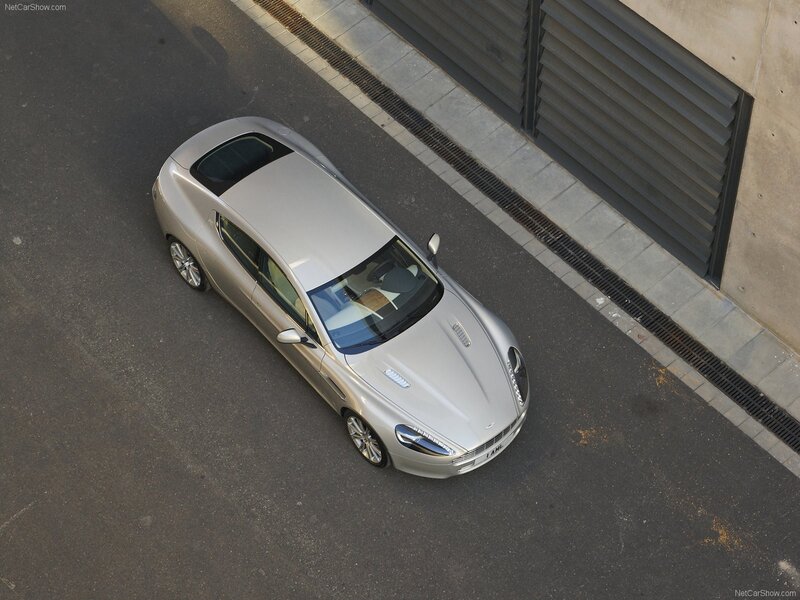 silver aston martin on street