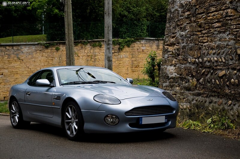 silver aston martin parked