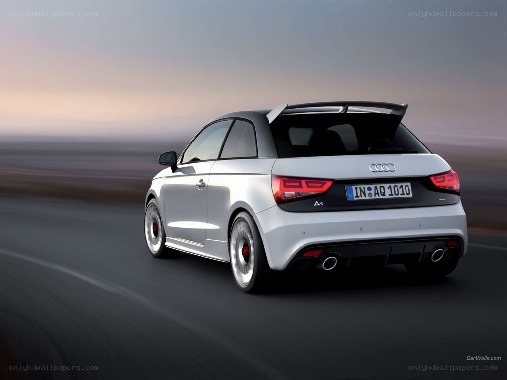 silver audi a1 driving on road