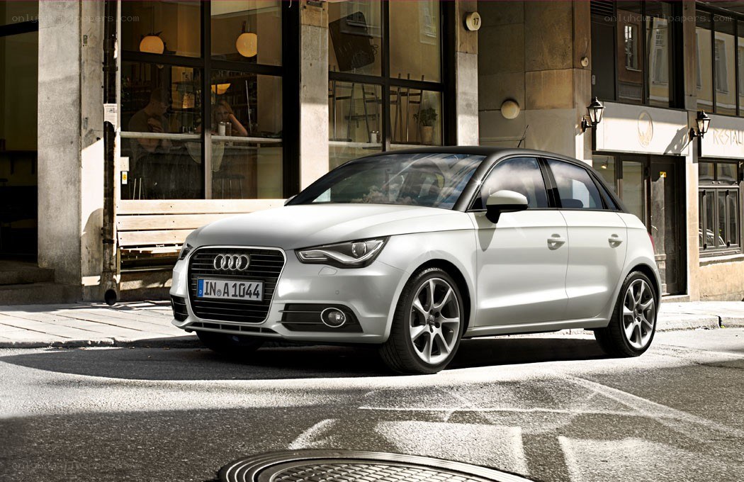 Silver Audi A1 on city street