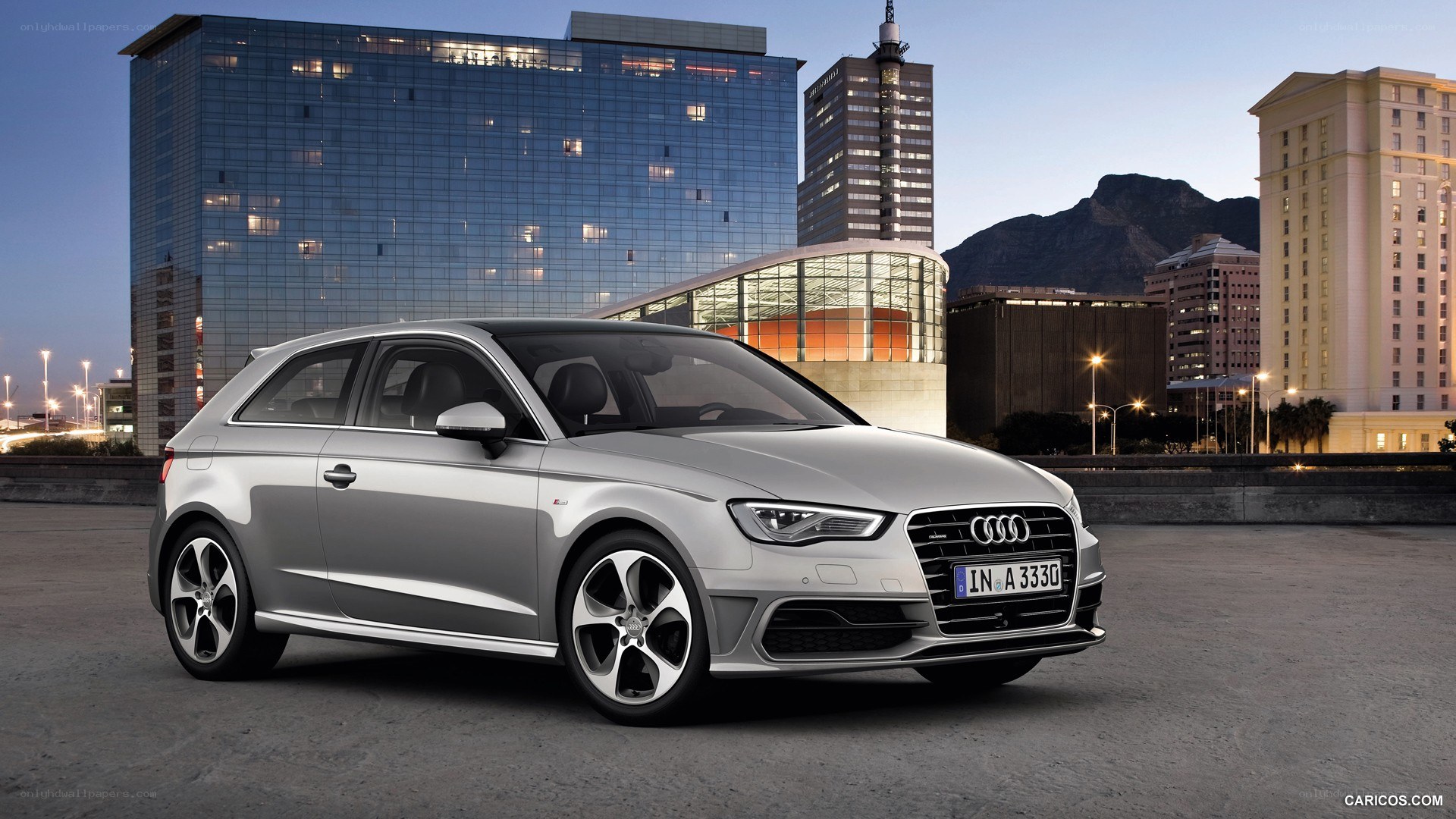 Silver Audi A3 in city setting