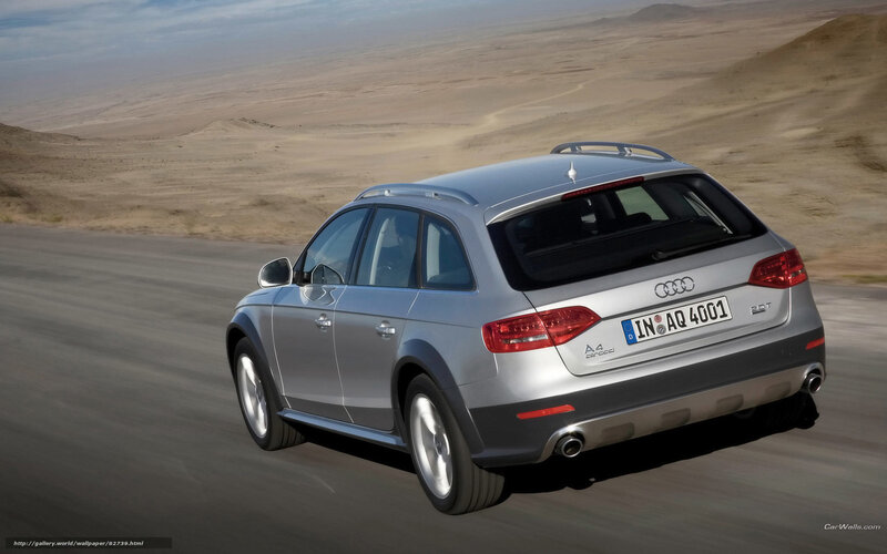 silver audi a4 allroad driving