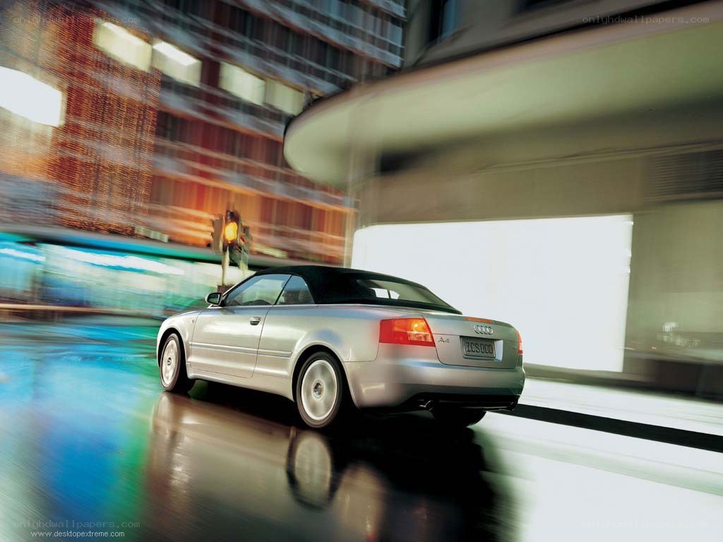 Silver Audi A4 Cabriolet in motion