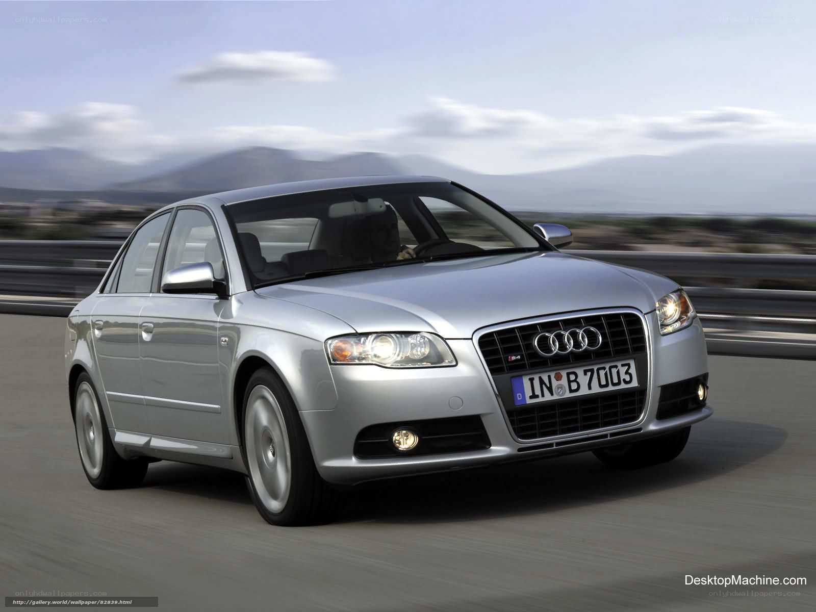 silver audi a4 in motion