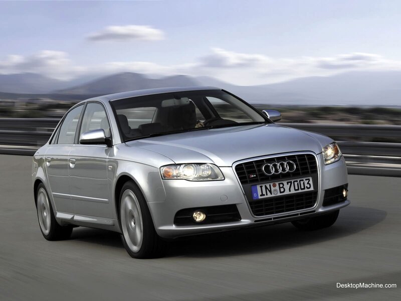 silver audi a4 in motion