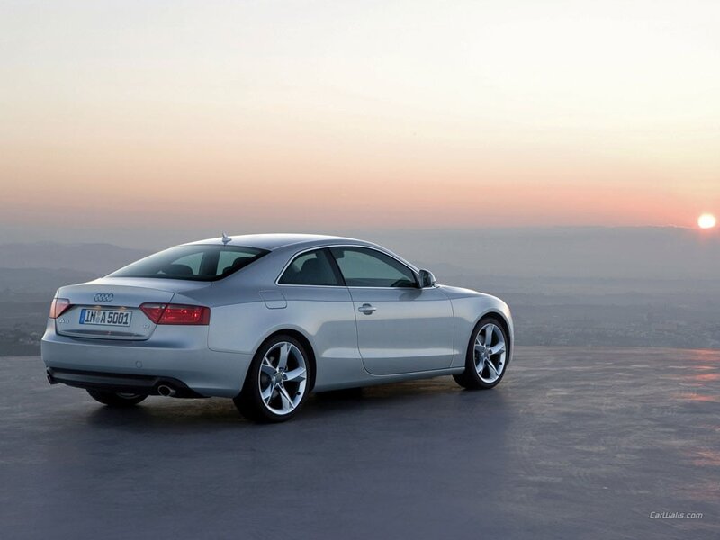 silver audi a5 at sunset