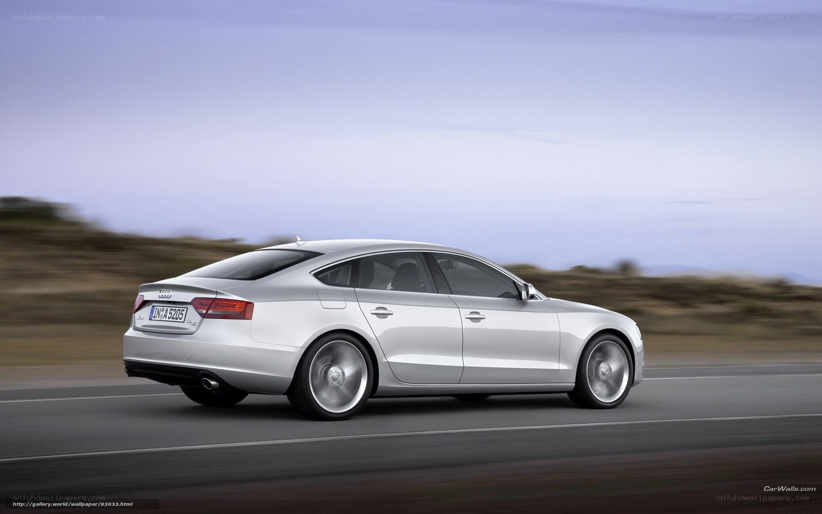 silver audi a5 in motion