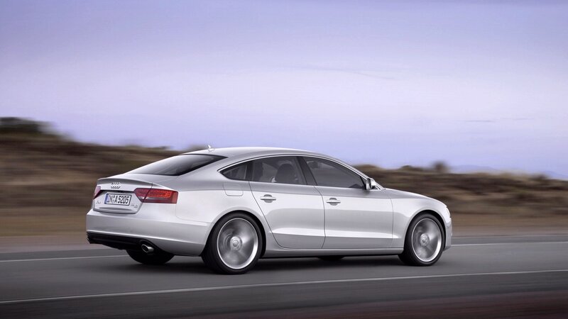silver audi a5 in motion