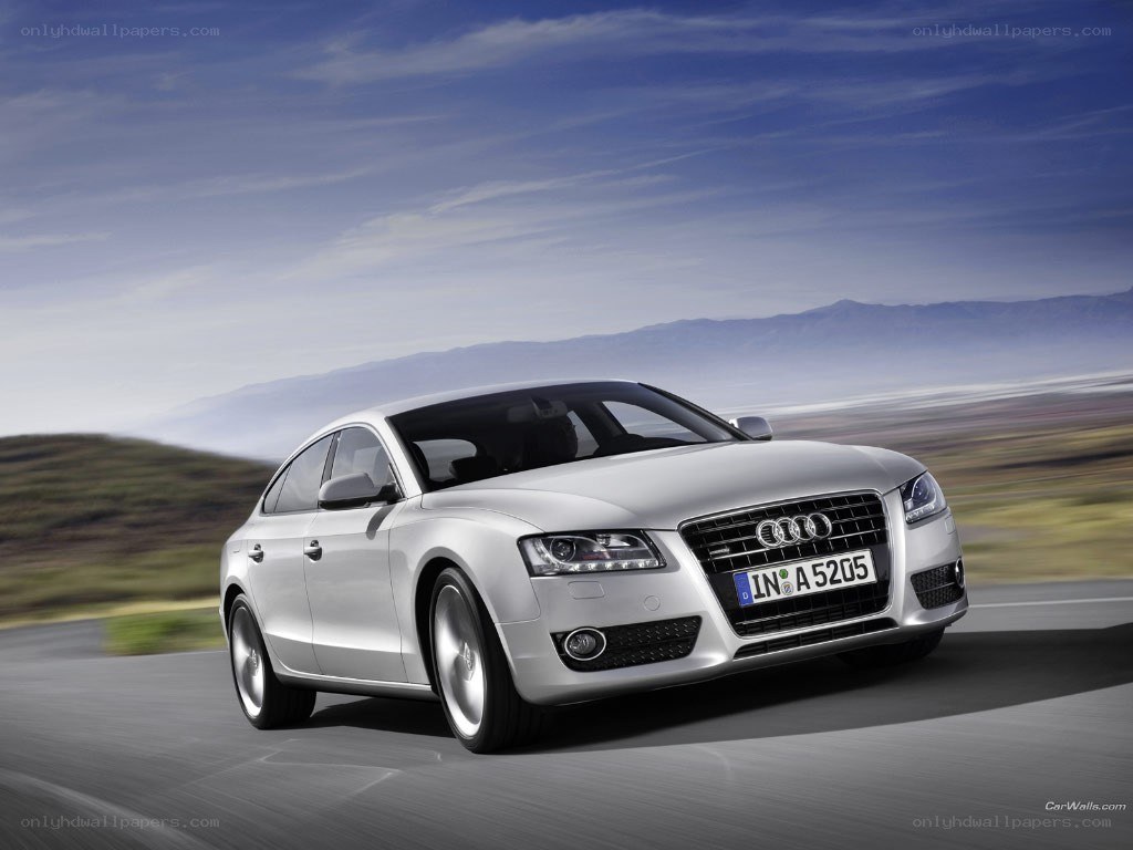 silver audi a5 in motion