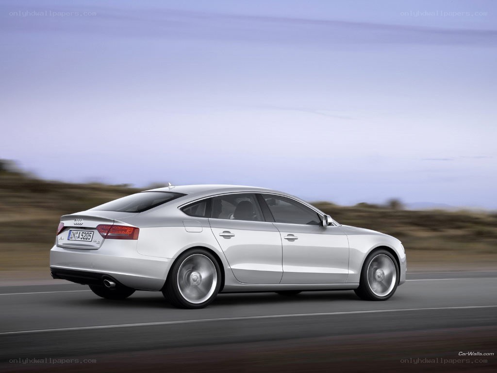 silver audi a5 in motion