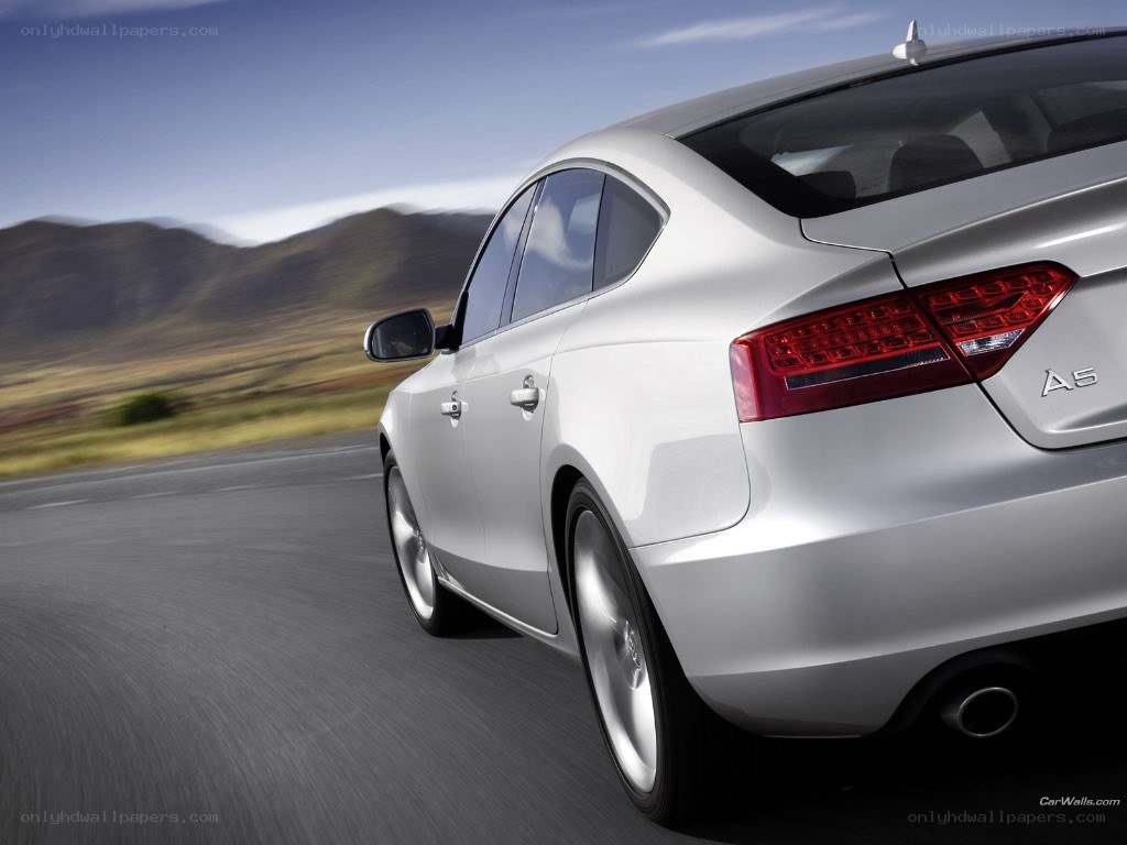 silver audi a5 in motion