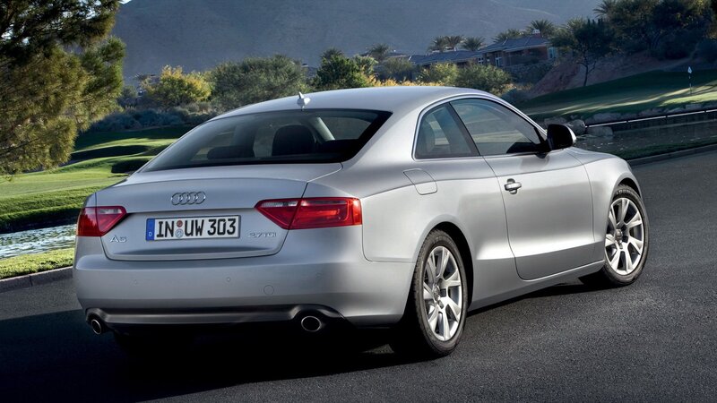 silver audi a5 on golf course