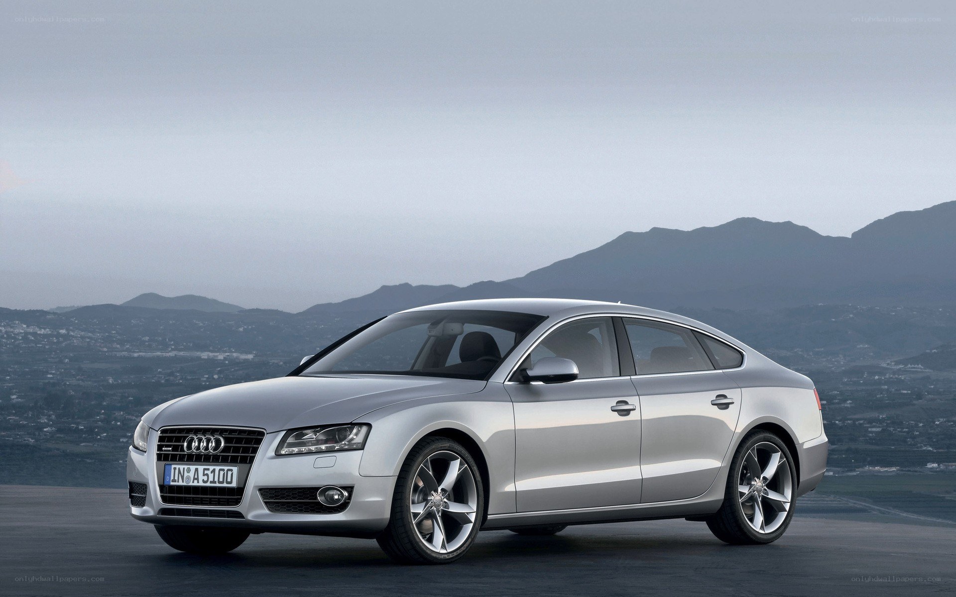 silver audi a5 sedan