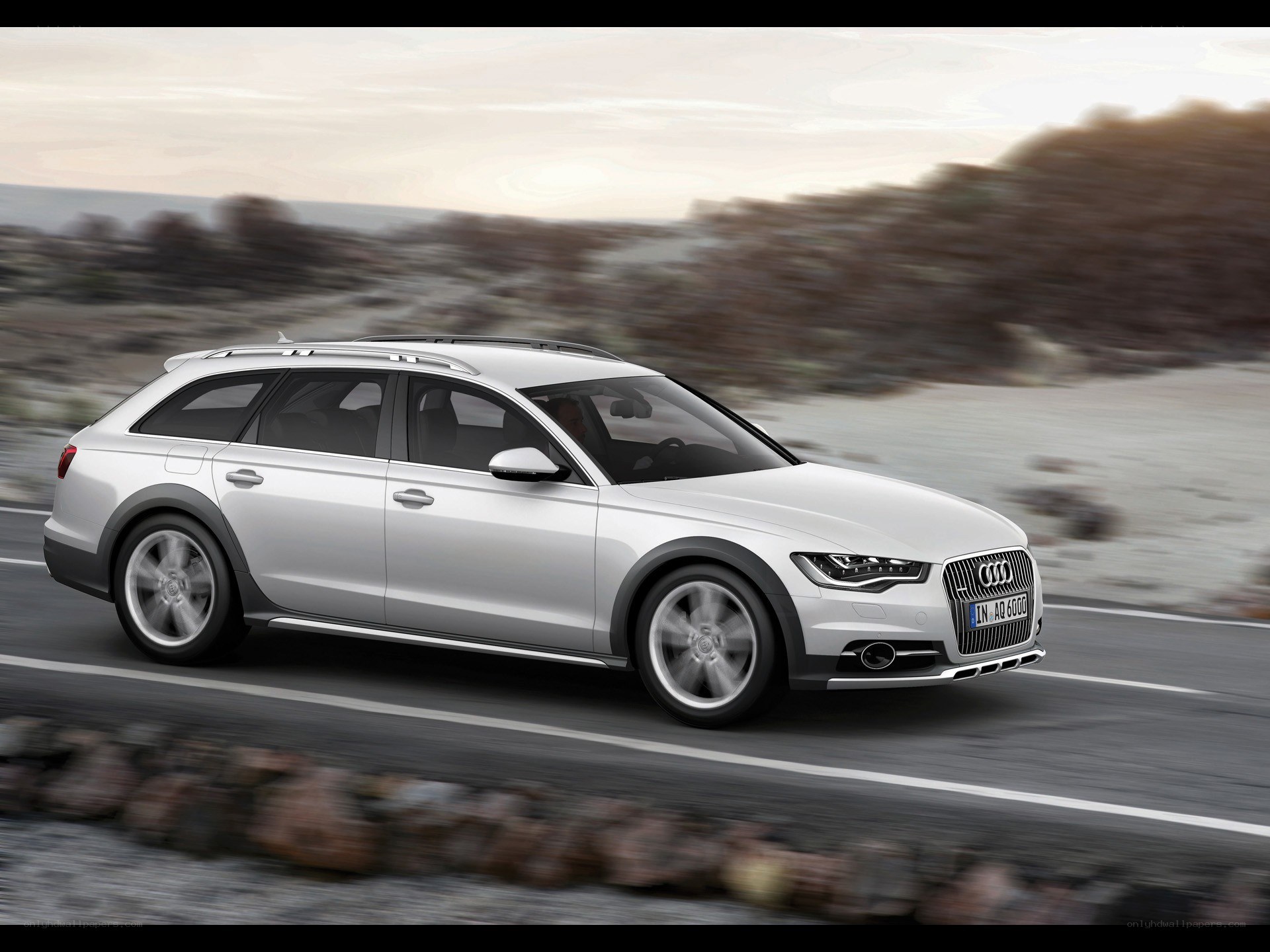 Silver Audi A6 Allroad in motion