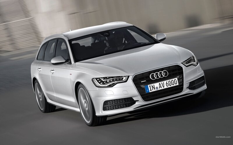 silver audi a6 avant in motion