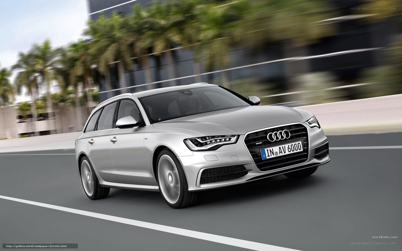 silver audi a6 avant in motion