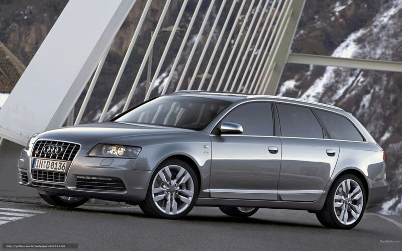 Silver Audi A6 Avant on a bridge